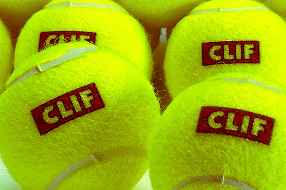 Clif Bar logo printed on promotional tennis balls, perfect for sports branding.