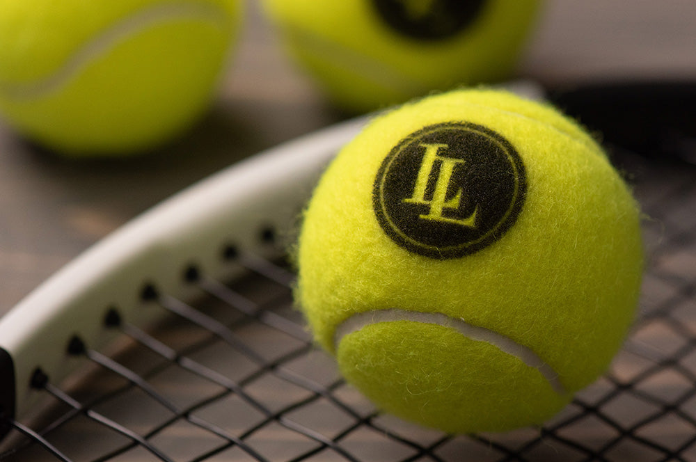 Branded tennis ball printing with custom logos, great for sponsorships and marketing.