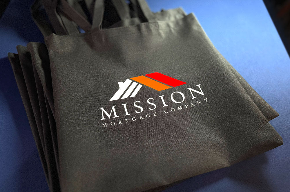 Black tote bag featuring a colorful custom logo design