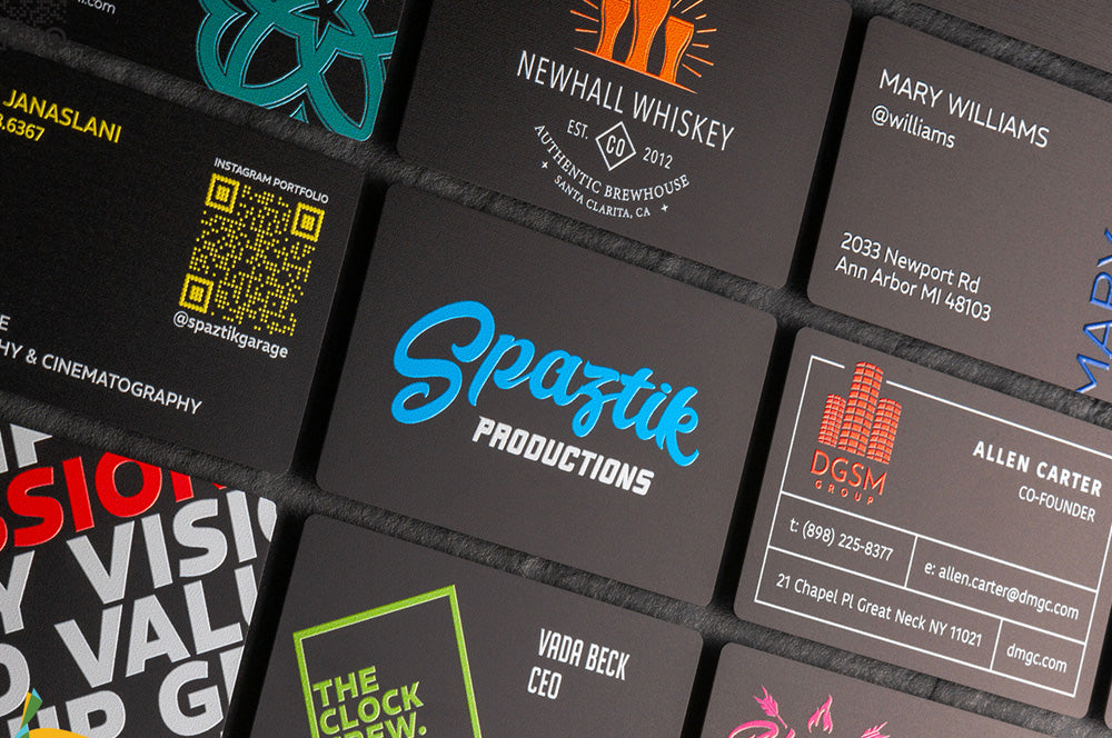 Full-color aluminum business card with a vibrant, high-quality print finish.