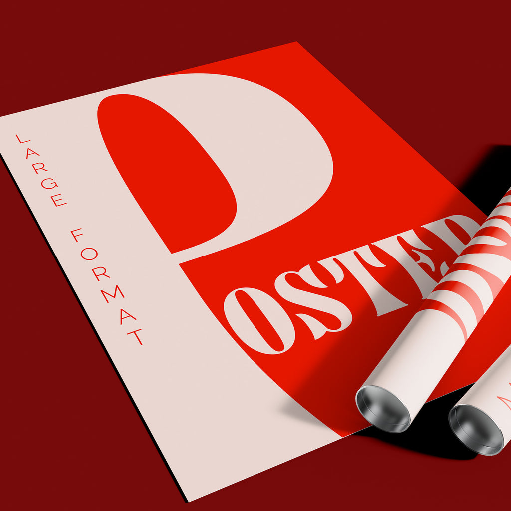 Rolled and unrolled large format custom posters with bold red and white design
