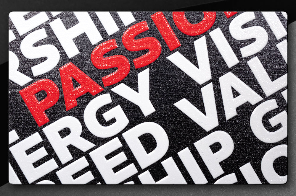 High-resolution full-color printed aluminum business card with a premium feel.