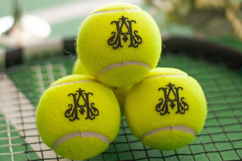 Personalized wedding tennis balls with custom messages, ideal for unique gifts.